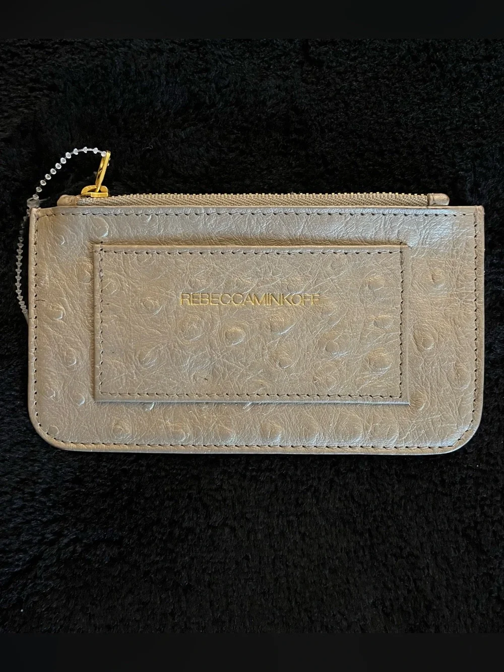 NWOT Rebecca Minkoff Beige Ostrich-Texture Zip Card Case with Gold Logo.